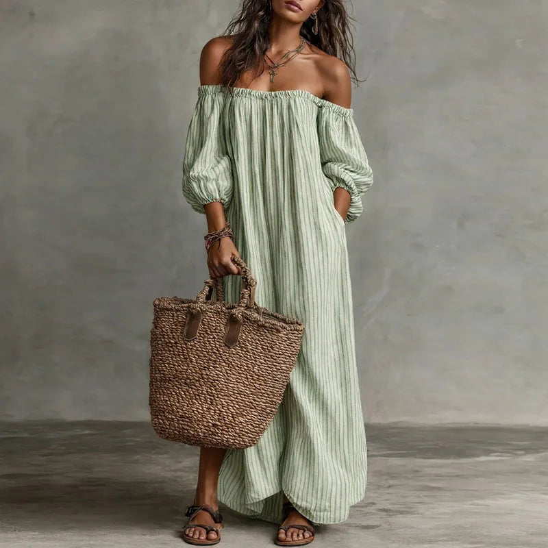 Elegant women's Madison midi dress, off-shoulder neckline and puff sleeves for a chic, feminine look.