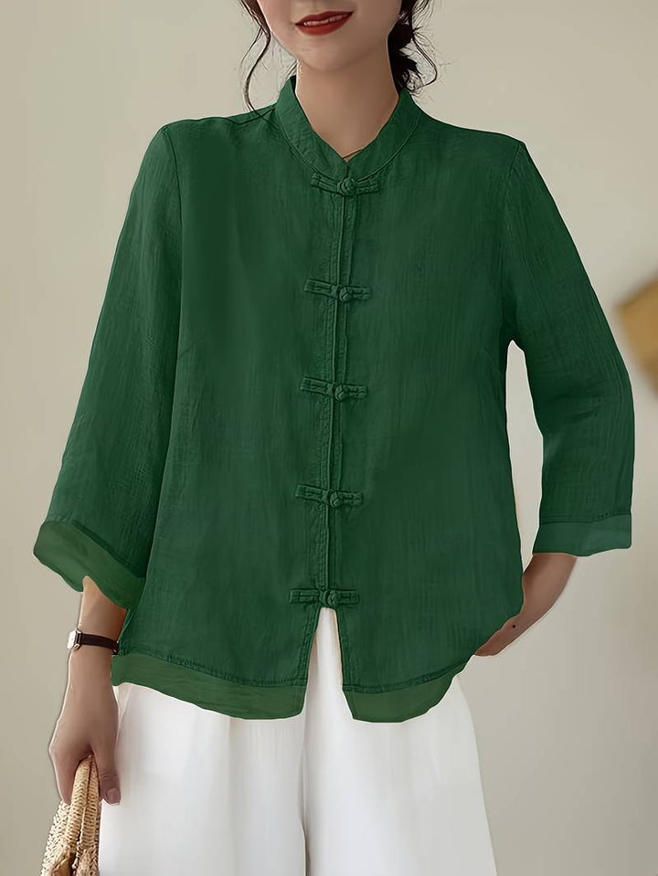 Women's Mandarin collar frog button blouse, elegant & casual, perfect for office or summer.