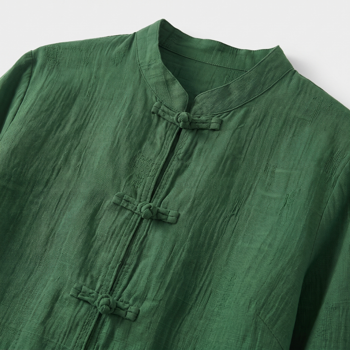Lightweight women's blouse, mandarin collar, frog buttons, three-quarter sleeves for summer.