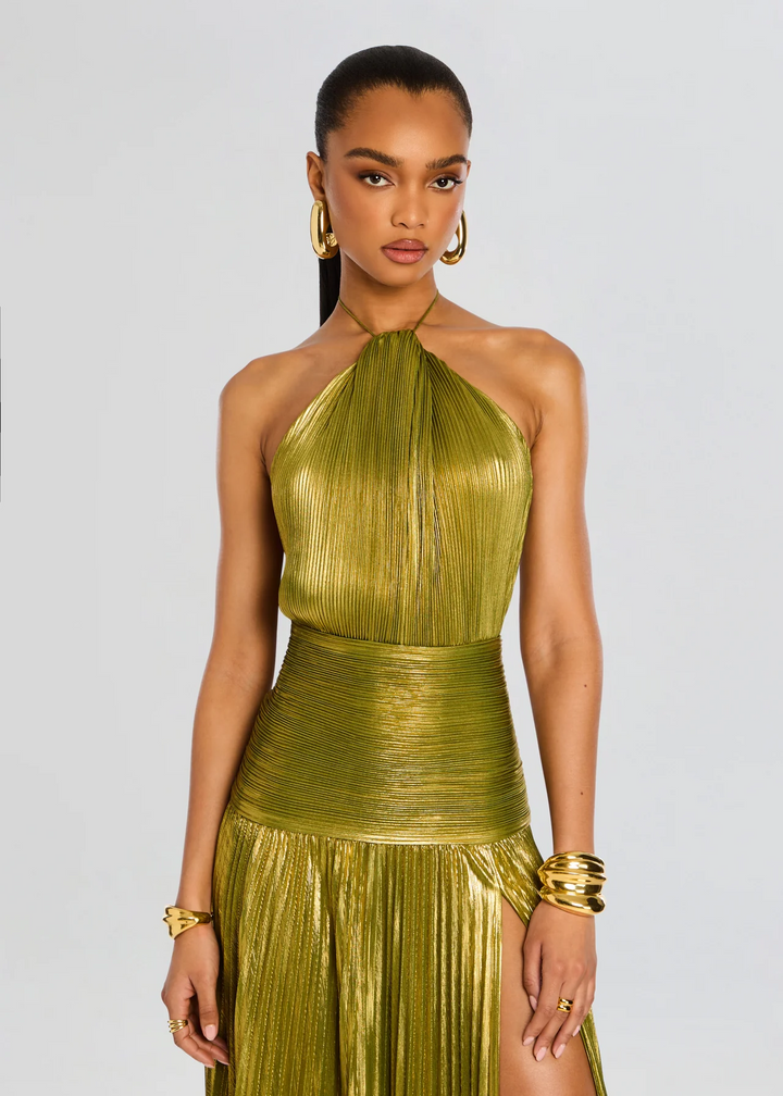 Shimmering metallic green maxi dress with a halter neckline and flowy skirt, best for formal wedding guests.