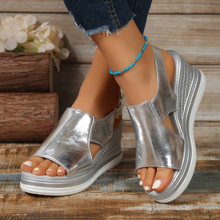 Women's metallic silver platform slingback sandals, perfect for parties & summer fashion. Open-toe wedge.