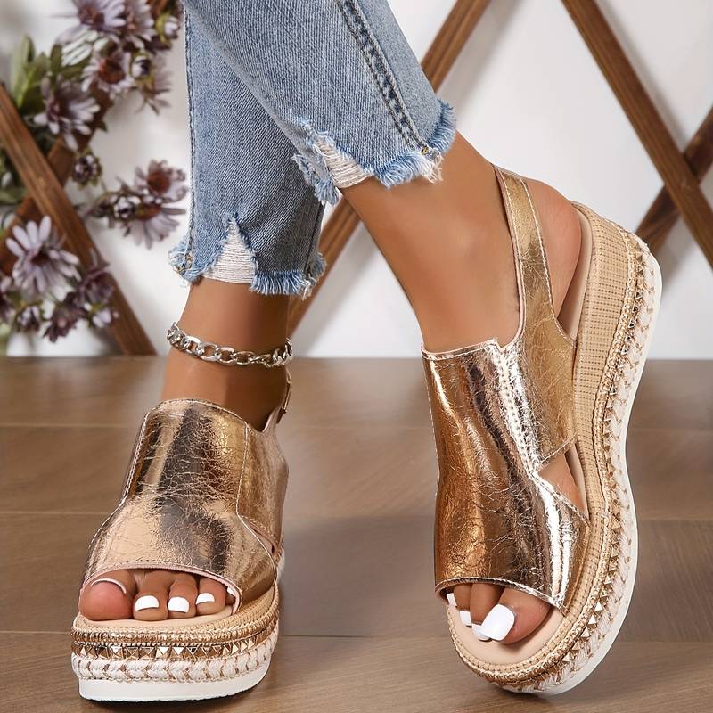 Elegant women's metallic gold platform slingback sandals. Comfortable open-toe wedge for dressy occasions.