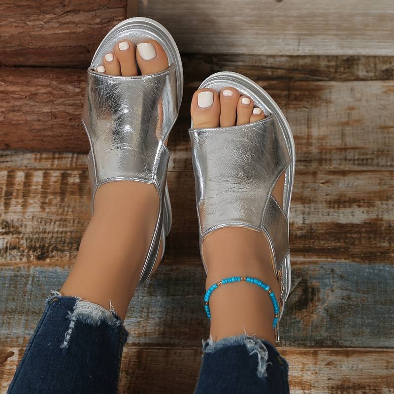Stylish women's metallic platform slingback sandals, great for summer parties or dressy events. Open-toe design.