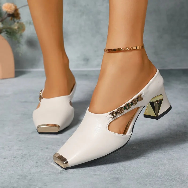 Elegant women's metallic toe block heel pumps, showcasing modern design