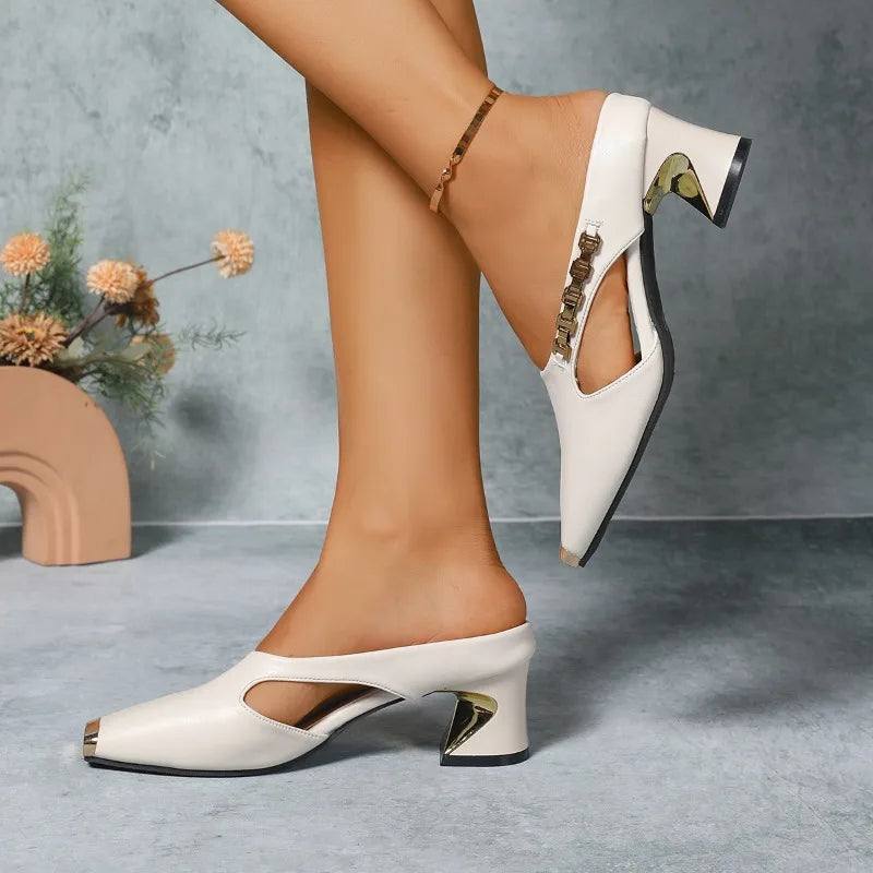Back view of women's metallic toe pumps, highlighting the stable block heel