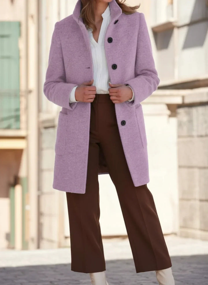 Classic women's mid-length coat for fall & winter. Stylish, warm outerwear with button-front design.