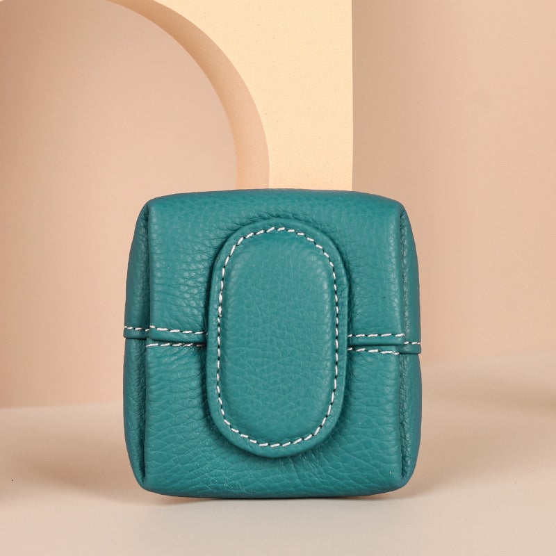 Classic navy blue mini leather coin purse, a durable and timeless accessory for women