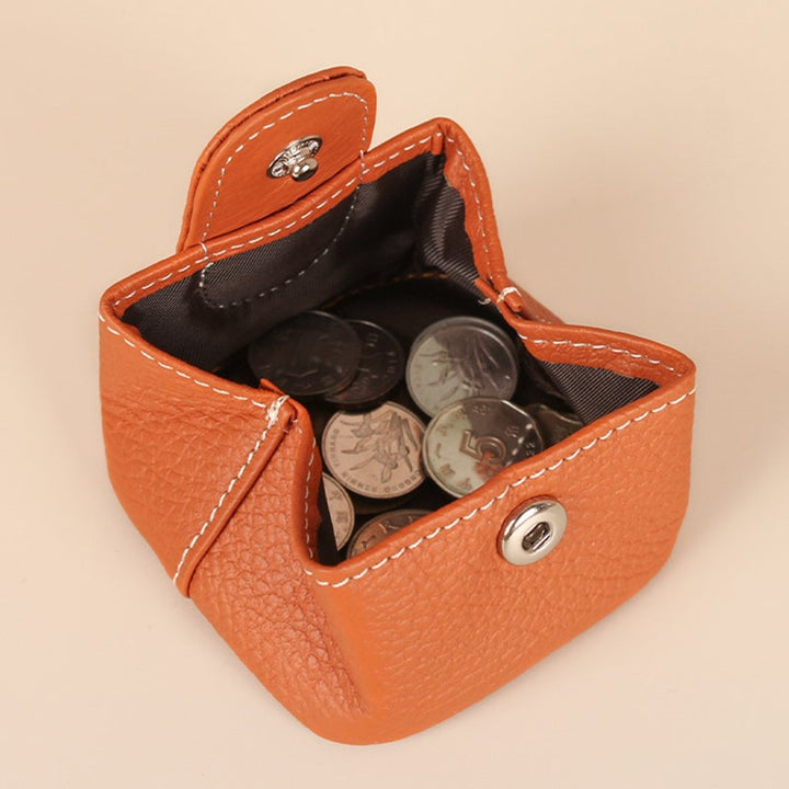 Brown leather mini coin pouch with gold zipper, an ideal gift for her