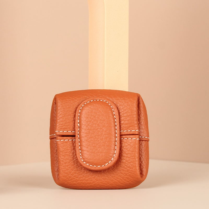 Textured black leather coin purse, a sophisticated addition to any handbag