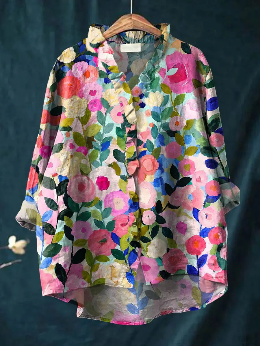 Women's Mirelle floral ruffle blouse, an elegant & lightweight boho chic top for spring and summer fashion.