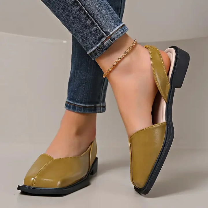 Comfortable women's slip-on flats with a stylish square toe design and durable vegan leather.