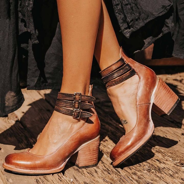 Fashionable women's closed-toe multi-strap block heel ankle boots; ideal for fall & winter.