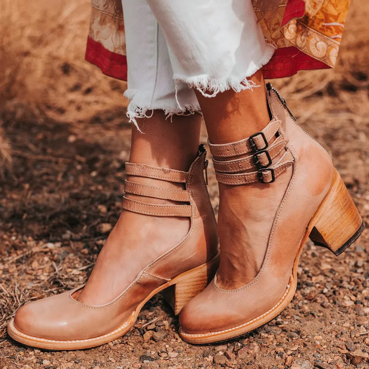 Comfortable multi-strap block heel ankle boots for women; durable and stylish everyday footwear.