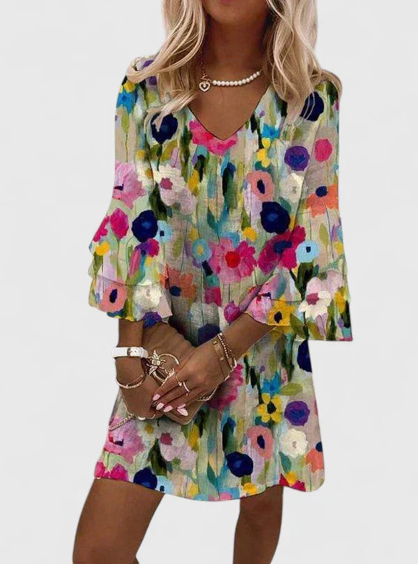 Women's multicolor floral v-neck mini summer dress with a relaxed fit, perfect for casual wear or vacation.
