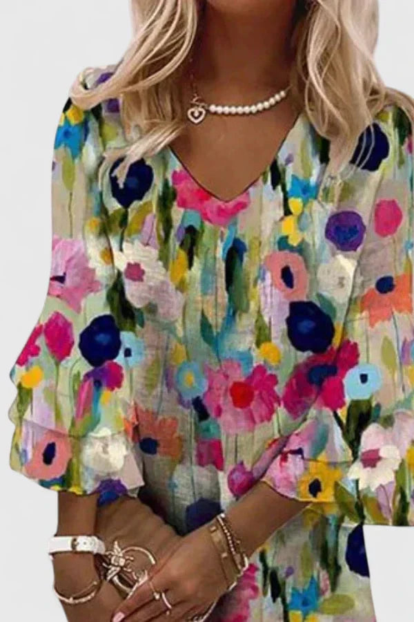 Vibrant multicolor floral v-neck mini dress for women, a comfortable relaxed fit summer style for vacation.