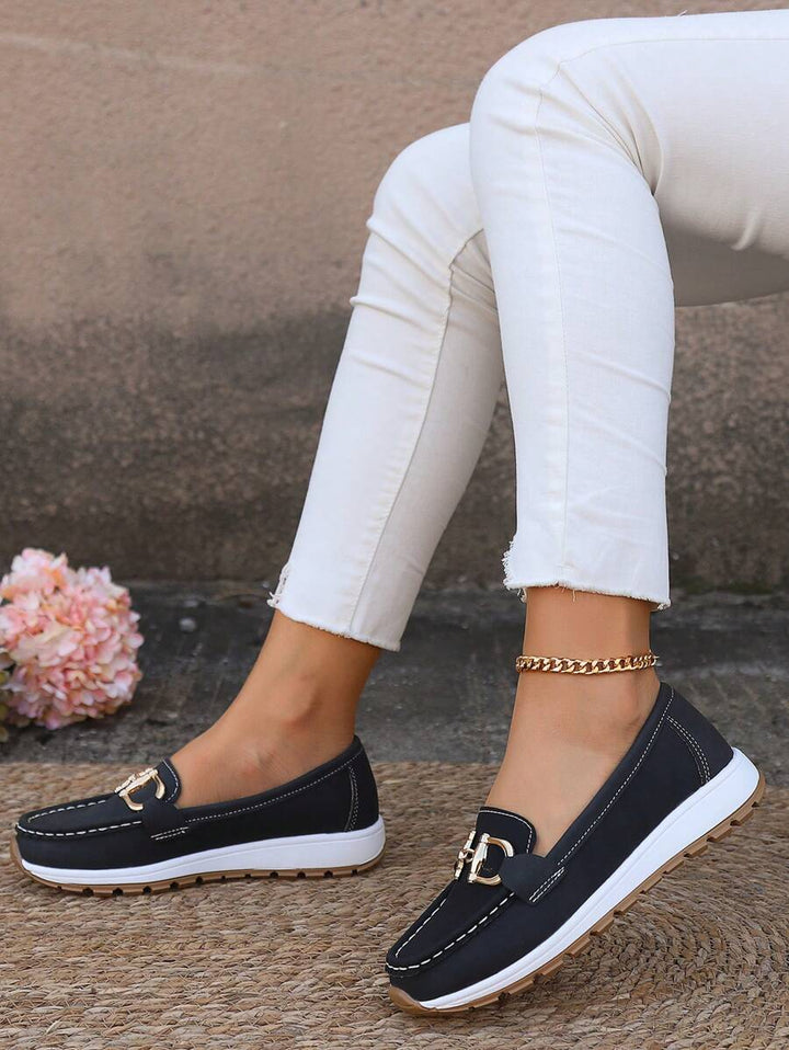 Elegant women's flats; versatile orthopedic loafers offering superior comfort & non-slip grip.