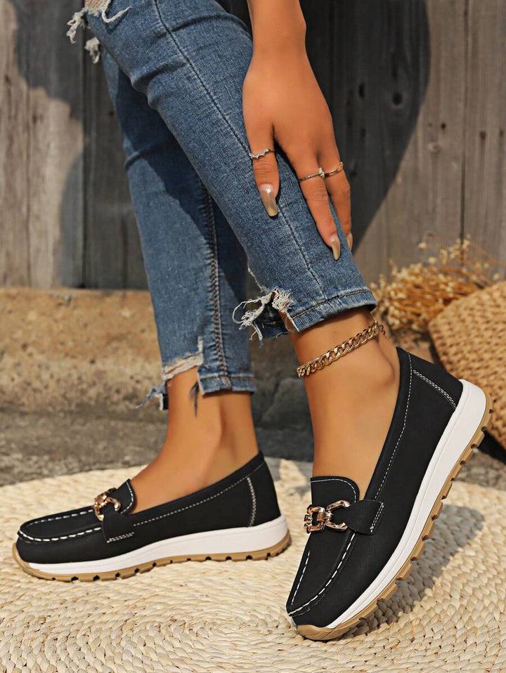 Front view of stylish women's orthopedic loafers, designed for comfort & slip resistance.