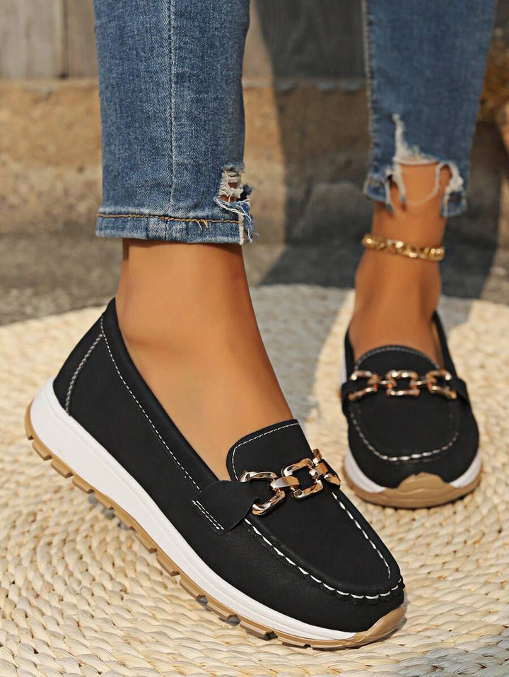 Close-up of the non-slip sole on women's orthopedic walking loafers for secure footing.
