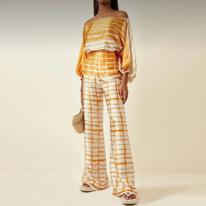 Casual off-shoulder printed two-piece set for women, great for everyday summer style & comfort.