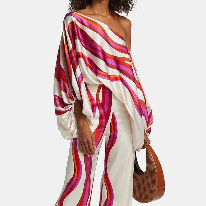 Trendy women's off-shoulder printed two-piece set. A must-have for summer casual wear.