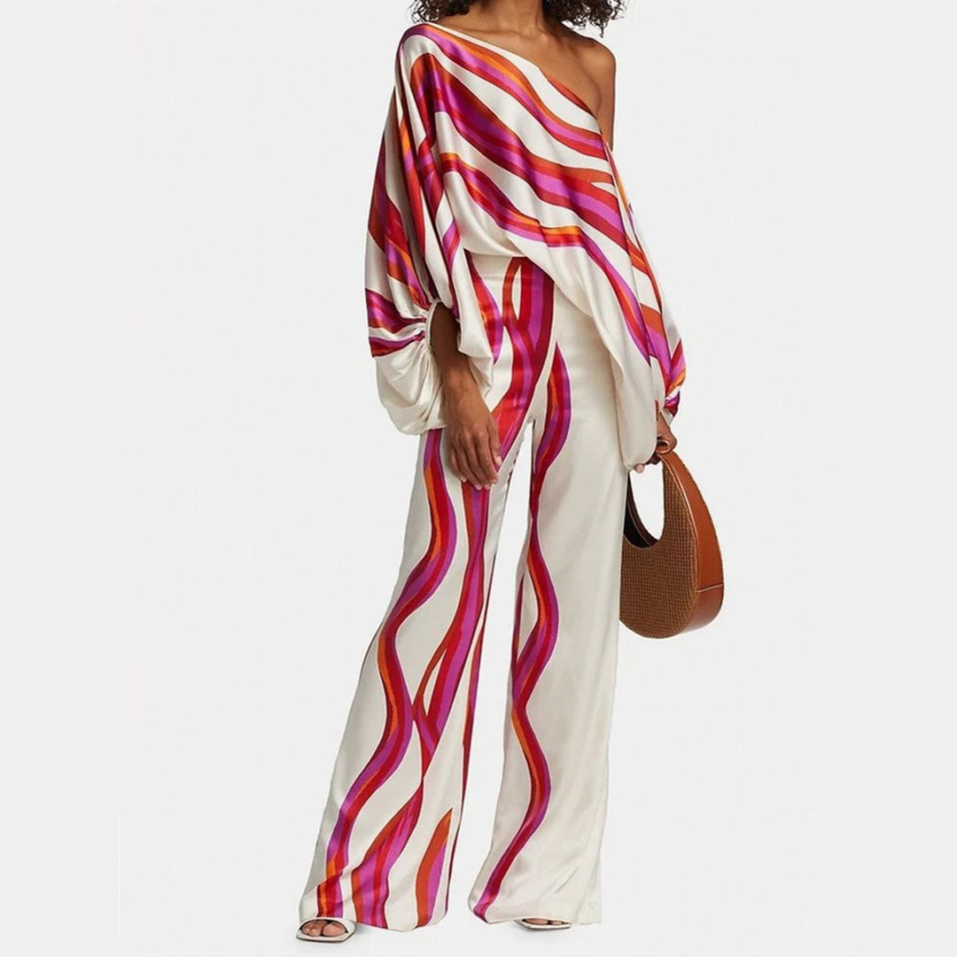 Elegant off-shoulder top with lantern sleeves & elastic waist. Part of a women's summer set.