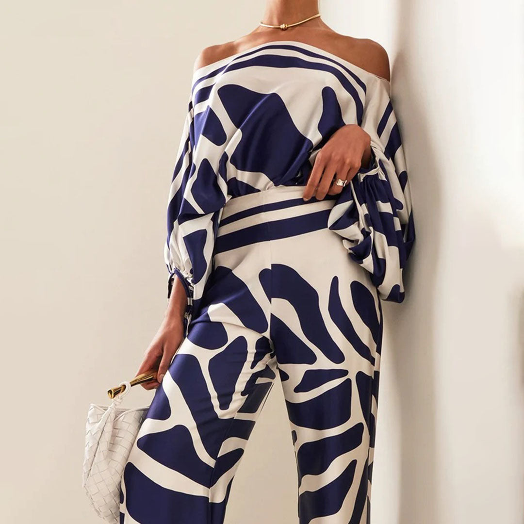 Vibrant printed off-shoulder two-piece set. A summer fashion essential for stylish women.