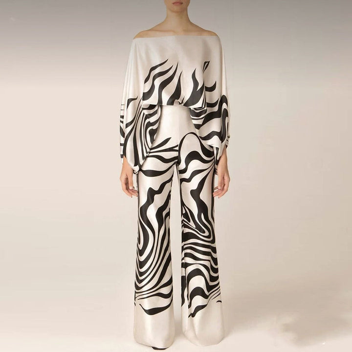 Complete women's off-shoulder summer two-piece set in a stylish, eye-catching print.
