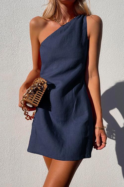Fashionable women's one-shoulder draped mini dress, sleeveless, offering an elegant casual summer party look.