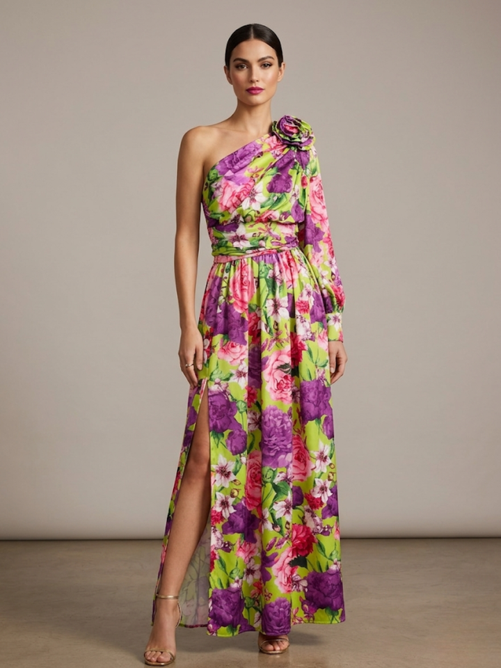 Elegant women's vibrant floral one-shoulder maxi gown with a stylish slit, ideal for evening events.