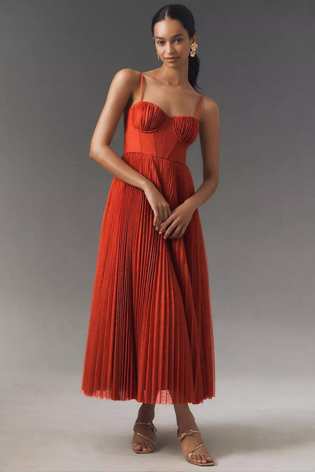 Flowing one-shoulder midi dress for women. Features delicate pleated tulle, perfect for special occasion or formal events.