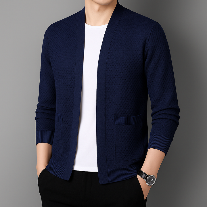 Detail shot of the ribbed trim on the cuffs of a women's midweight knit cardigan.