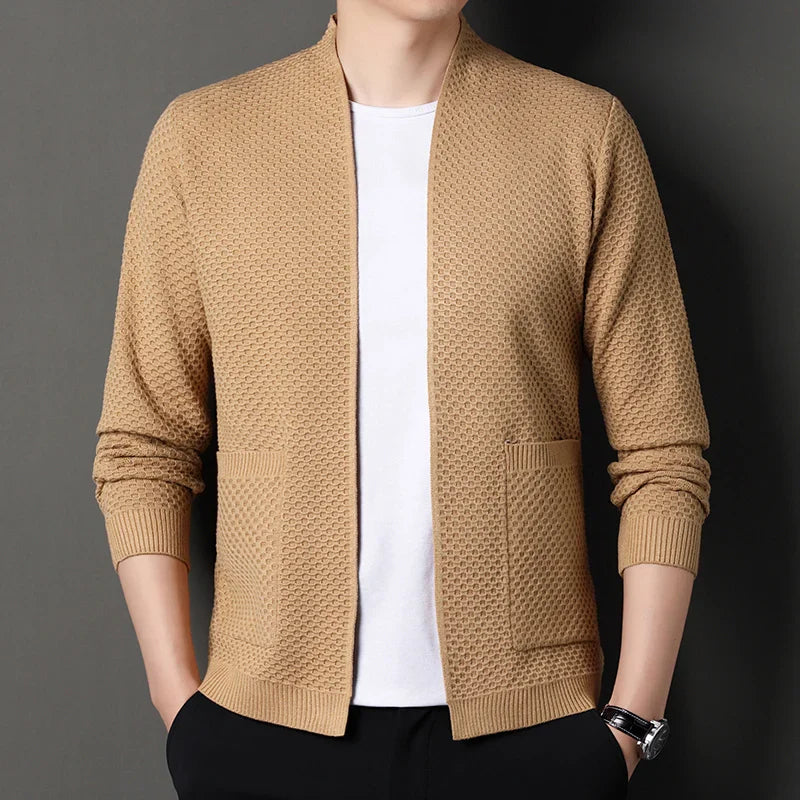 Women's cardigan elegantly draped, highlighting the soft knit and versatile open-front style.