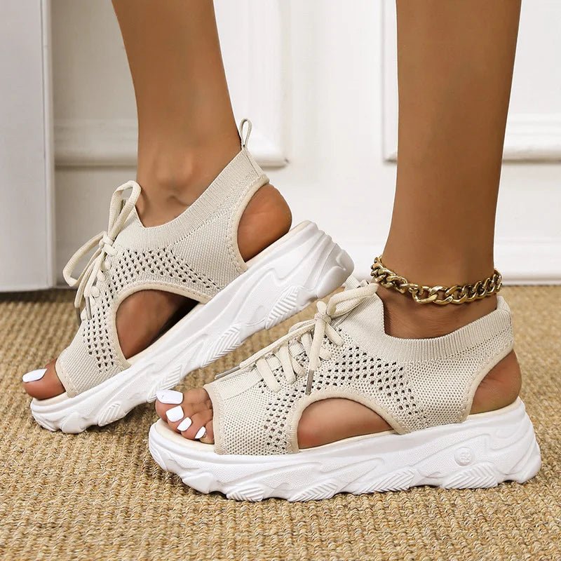 Close-up of women's open-toe platform sandals showing the adjustable lace-up closure for a custom fit.