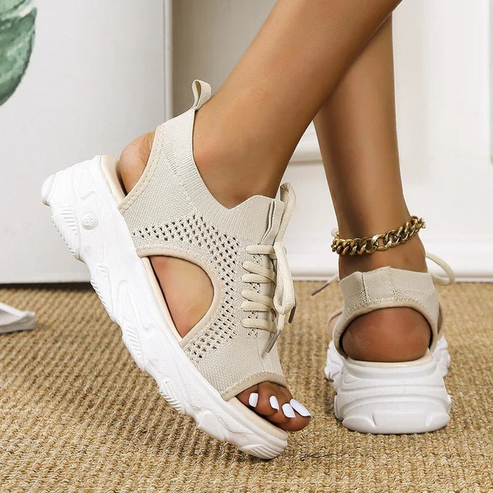 Modern women's platform sandals with open-toe & lace-up details, suitable for any casual summer occasion.