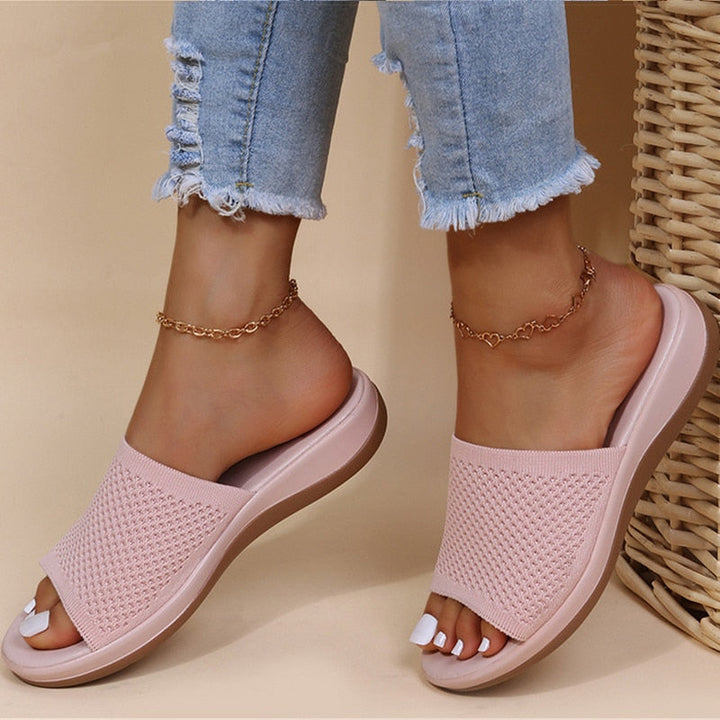 Breathable open-toe women's sandals, comfortable flat sole slip-on for indoor & casual summer wear.