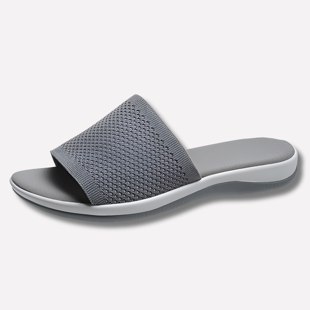 Soft, breathable open-toe women's slippers for ultimate comfort. Perfect flat sole casual house shoes.