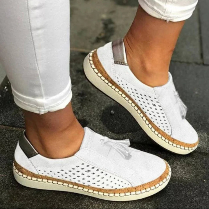 Handcrafted women's comfort slip-ons with Orthoflex orthopedic support, ideal for long walks & everyday fashion.