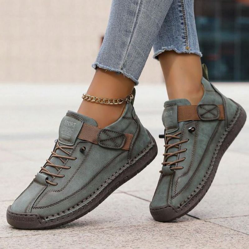 Stylish women's lace-up ankle sneakers for casual wear, offering orthopedic comfort & support.