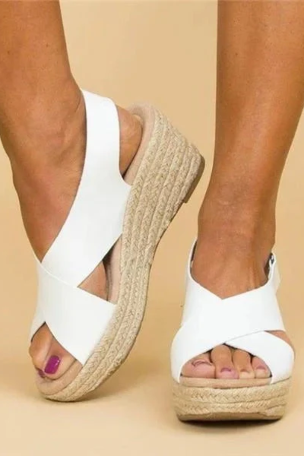 Fashionable women's espadrille wedge sandals with adjustable straps & arch support, ideal for casual summer wear.