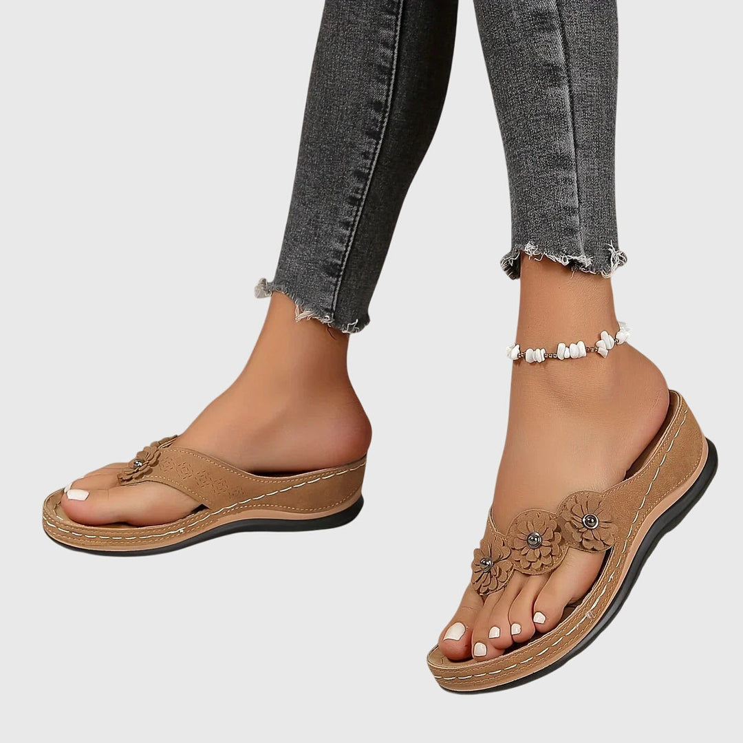 Premium women's arch support flip flops, providing all-day comfort and supportive relief for your feet.