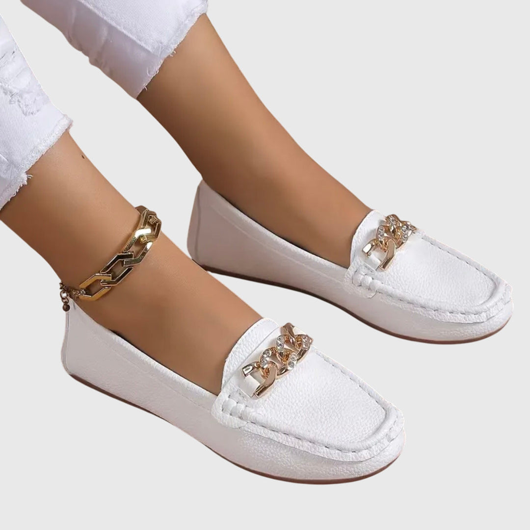 Premium women's orthopedic loafers; elegant slip-on shoes for versatile, comfortable wear.