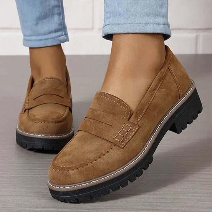 Orthopedic women's loafers featuring arch support for comfortable foot health.