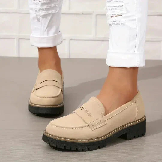 Comfortable women's walking shoes: orthopedic loafers with essential arch support for long days.
