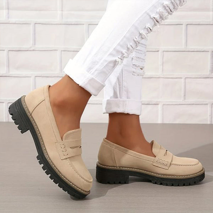 Fashionable platform loafers for women, offering orthopedic arch support & superior comfort.