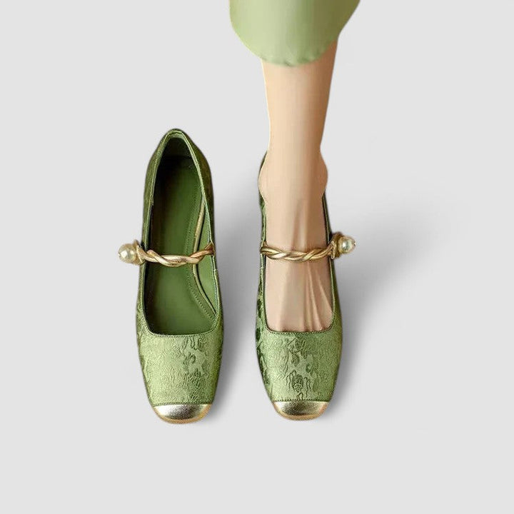 Side view of women's orthopedic Mary Jane buckle shoes, showcasing elegant design & low block heel.