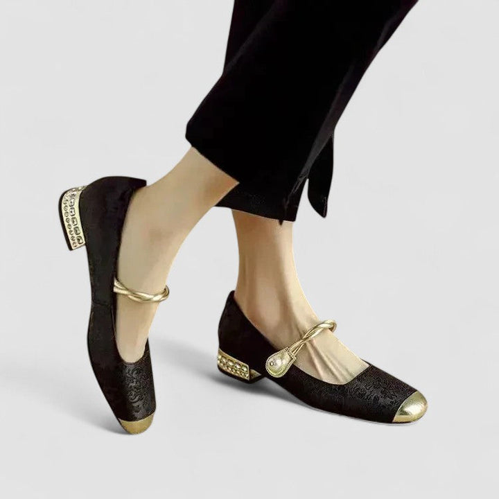 Woman wearing comfortable orthopedic Mary Jane shoes with a supportive low block heel.