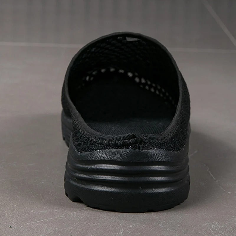 Women's slip-on orthopedic mesh walking sneakers, built-in arch support for cushioned foot comfort.