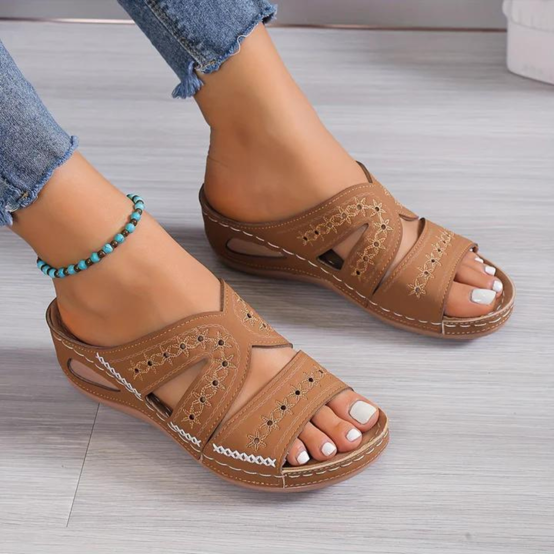 Elegant open-toe women's sandals, featuring orthopedic design for ultimate comfort & support in summer.