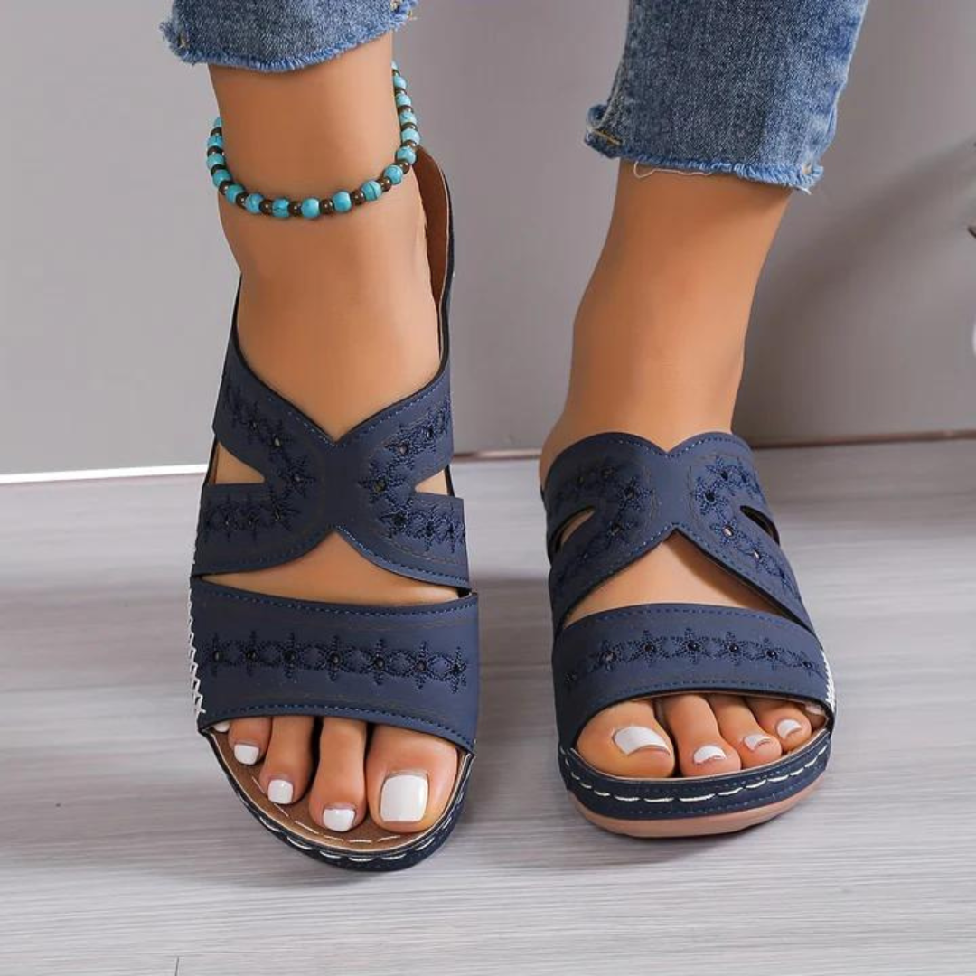 Comfortable women's footwear: open-toe orthopedic sandals with cushioned support for everyday fashion.