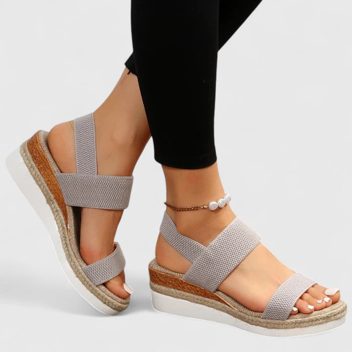 Slip-on women's orthopedic open-toe wedge sandals, providing arch support & comfort for daily wear and walks.